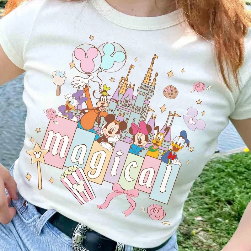Product My First Trip 2026 Castle Mickey And T-shirt Hoodie Sweater Friends Magical Minnie Donald Daisy Pluto Goofy